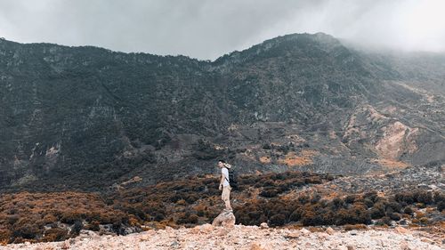 Scenic view of landscape against mountain range