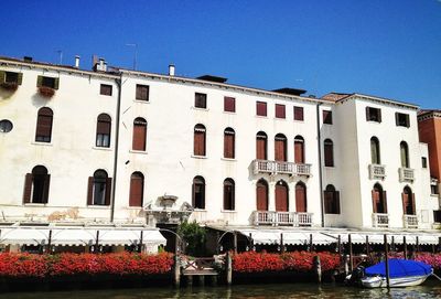 Low angle view of building against blue sky