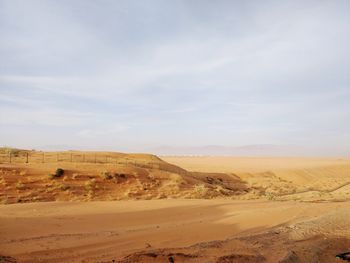 Scenic view of desert against sky