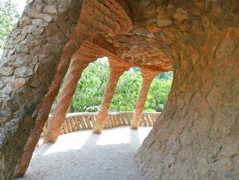 View of stone wall through rock