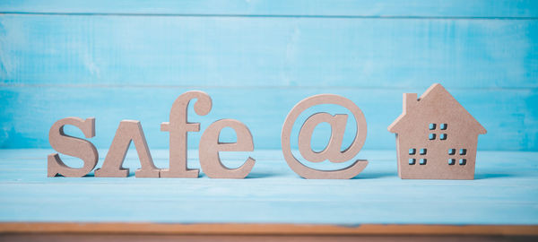 Close-up of text on blue table