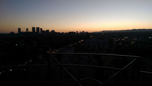 View of cityscape at sunset