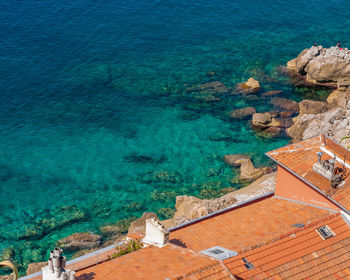 High angle view of house by sea