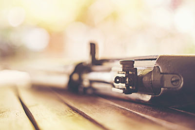 Close-up of gun on table