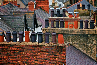 High angle view of chimneys on roofs