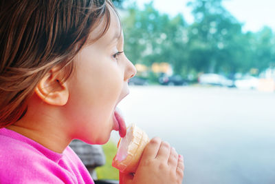 Close-up of girl eating ice cream