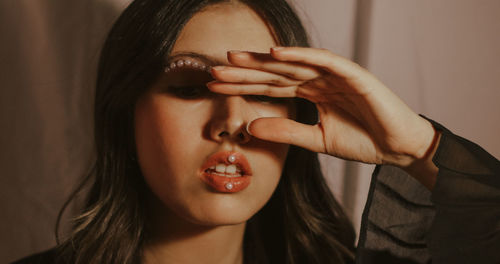 Close-up portrait of beautiful young woman