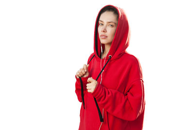 Portrait of a beautiful young woman over white background