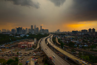 High angle view of cityscape against sky at sunset