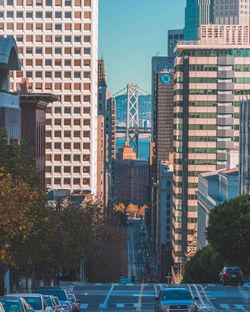 Modern buildings in city against sky