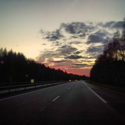 Empty road at sunset