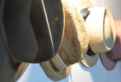 Close-up of metal hanging on rope