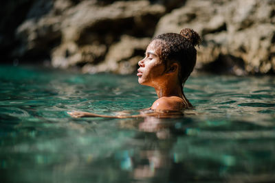 Young woman in sea