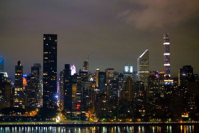 Illuminated city lit up at night