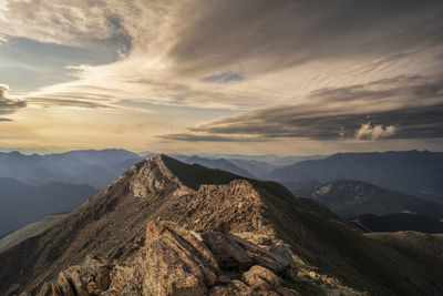Scenic view of mountains against sky during sunset