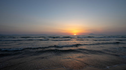 Scenic view of sea against sky during sunset