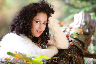 Portrait of smiling young woman outdoors