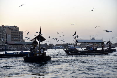 Dubai skyline from dubai creek harbour and dubai canal to downtown and business bay, uae