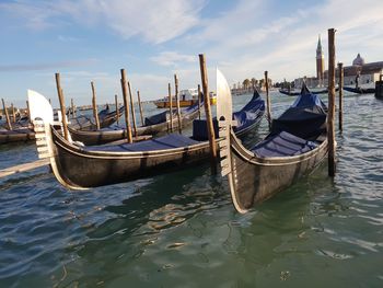 Boats moored in sea