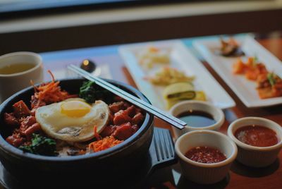 Close-up of breakfast served on table