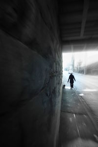 Man in tunnel