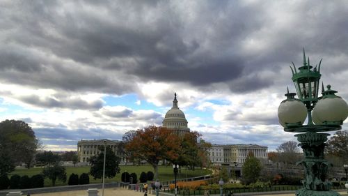 View of city against cloudy sky