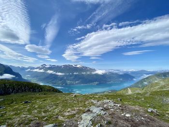 Scenic view of snowcapped mountains against sky