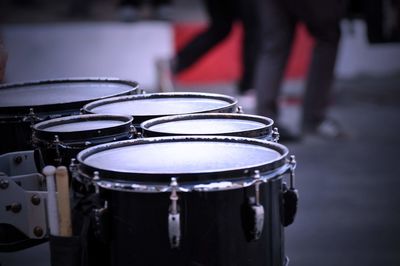 Close-up of drums on road