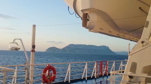 Ship at sea against sky