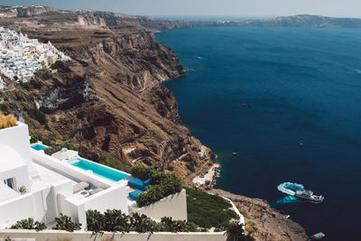 High angle view of townscape by sea