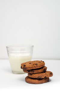 Close-up of cookies against white background