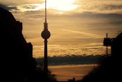 Silhouette of tv  tower at sunset