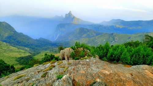 Beautiful scenic view from kodanad view point ooty of misty rain cloud hill mountain green forest