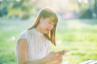 Man using mobile phone outdoors