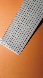 Low angle view of orange wall