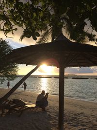 Scenic view of sea at sunset