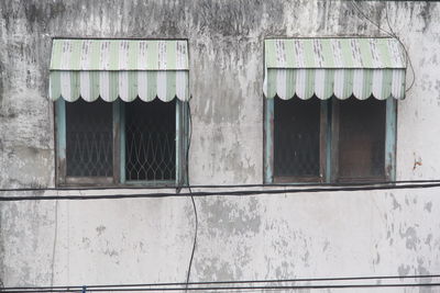 Closed window of old building