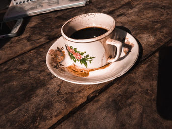 High angle view of coffee cup on table