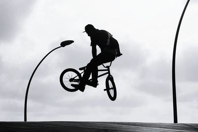 Low angle view of man jumping