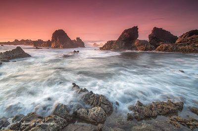 Scenic view of sea against sky during sunset