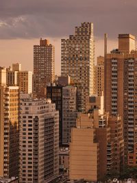 High angle view of buildings in city against sky