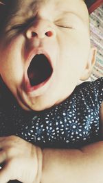 Portrait of yawning baby