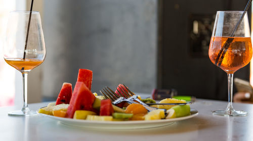 Close-up of fruits in plate on table