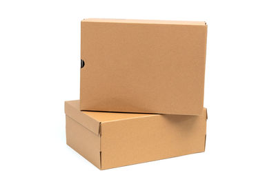 Low angle view of paper against white background