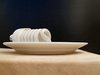 Close-up of white bowl on table