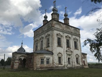 Low angle view of church against sky