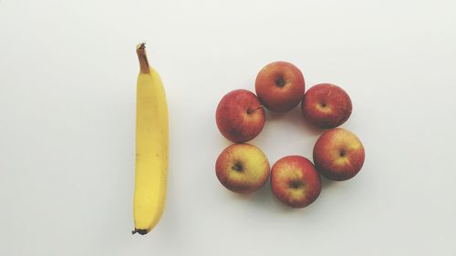 High angle view of apples against white background