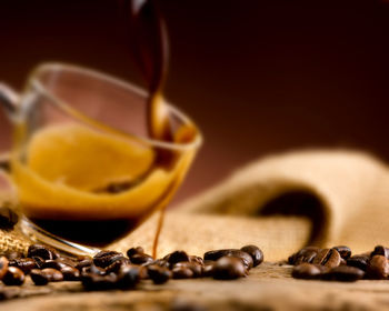 Close-up of coffee beans on table