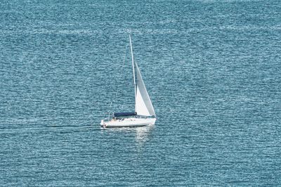 High angle view of sailboat sailing in sea