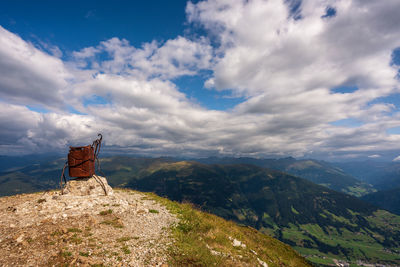 Old burnt out gas cans in the mountains